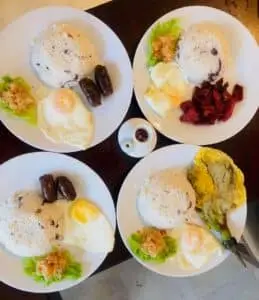 Traditional Filipino breakfast served at The Escape hotel, located near the best kainan spots in San Juan.