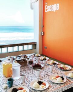delicious food served in front of a sea view at the hotel san juan